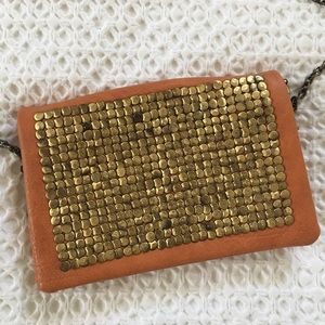 Purse with gold embellishments